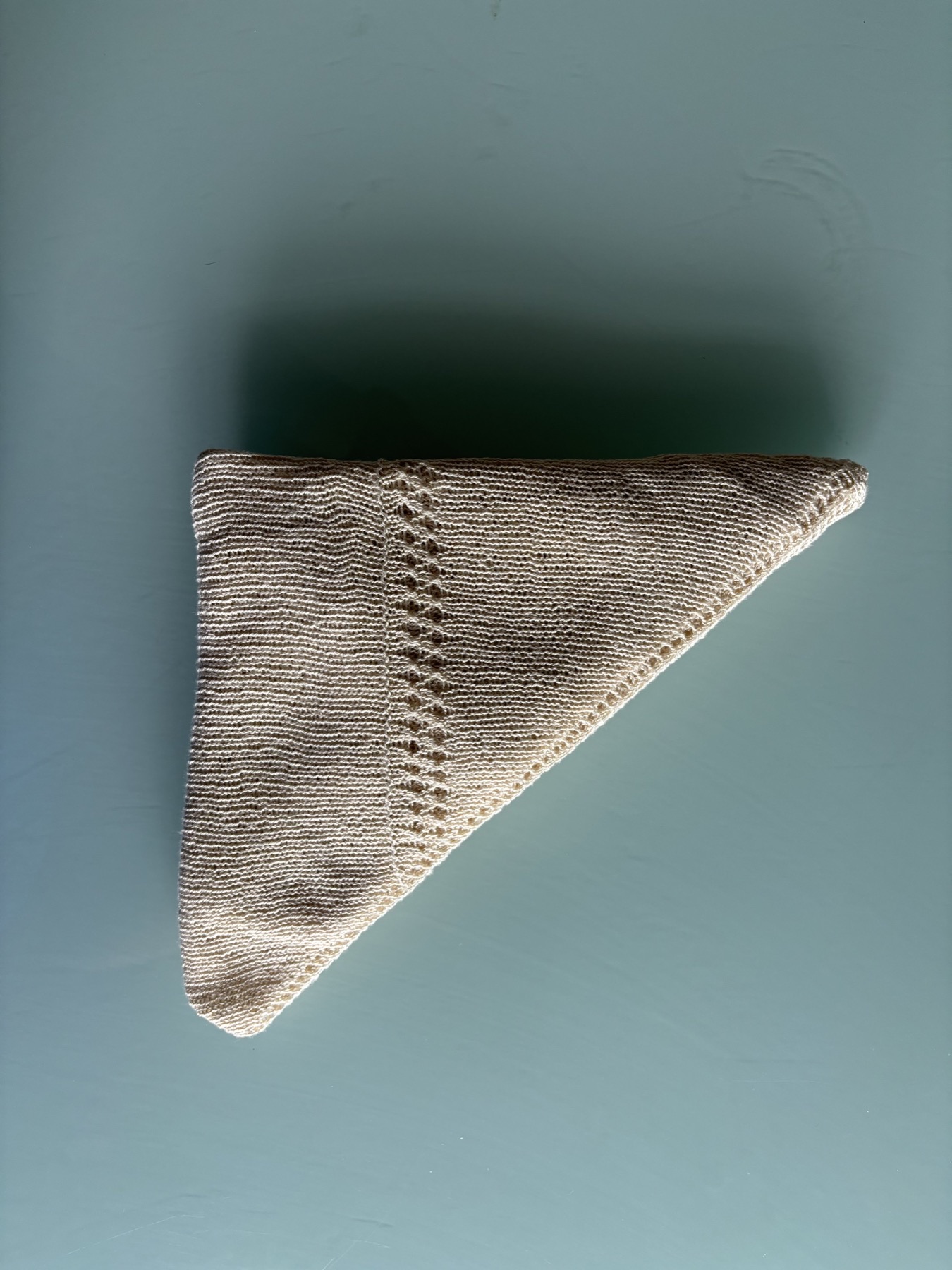 Mulberry silk rebozo folded into a triangle